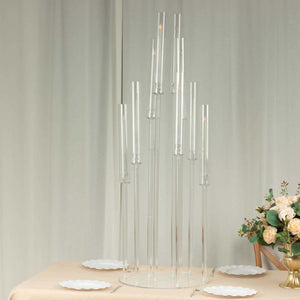 Modern glass candle holder centerpiece with multiple clear tubes.