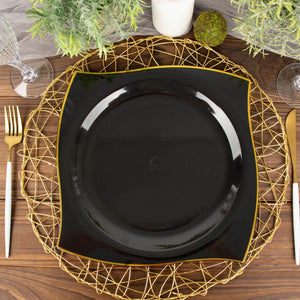 Elegant black square plate on a decorative gold charger.