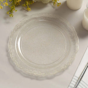 Clear decorative plate with a scalloped edge and glitter accents.