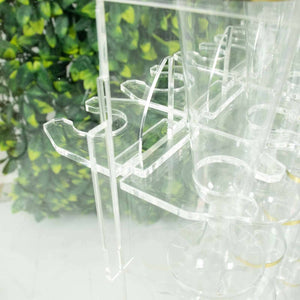 Acrylic drink holder with multiple compartments for glassware.