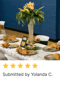 jungle theme table setting with centerpiece, plates, tablecloth, chair covers, and napkins by Yolanda C