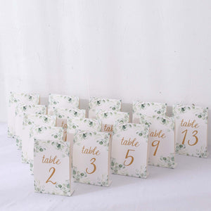 Elegant table numbers with floral design for weddings or events