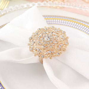 Elegant rose gold napkin ring with intricate design and sparkling rhinestones.