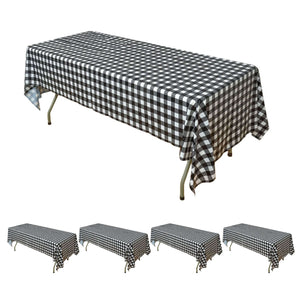 Black and white checkered tablecloth on a folding table