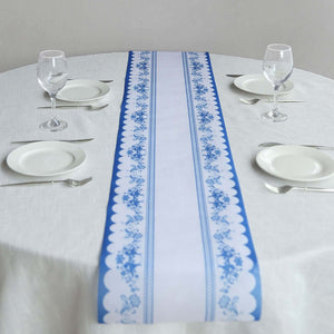 Blue and white decorative table runner on a dining table setting.