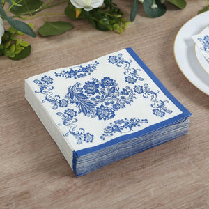 Blue floral decorative napkins in a stacked arrangement.