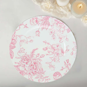 Floral design ceramic plate with pink accents on a white background.