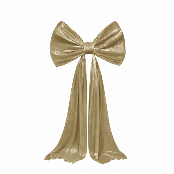 Gold metallic decorative bow with long ribbon tails on white background#whtbkgd