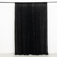 A black velvet curtain with measurements on a white background, perfect as a room divider, solid bac