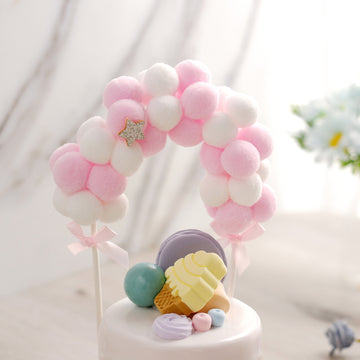 Enhance Your Party Decor with the Pink/White Cotton Ball Arch Cake Topper