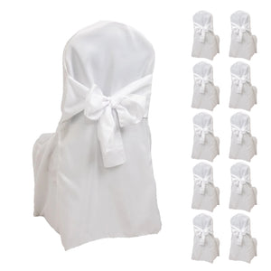 White chair covers with bows, set of 10 for elegant event decor.