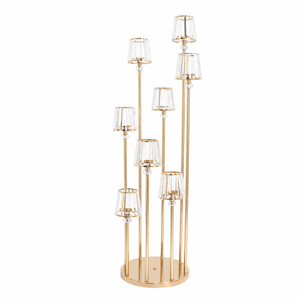 Gold multi-light floor lamp with clear glass shades on a round base