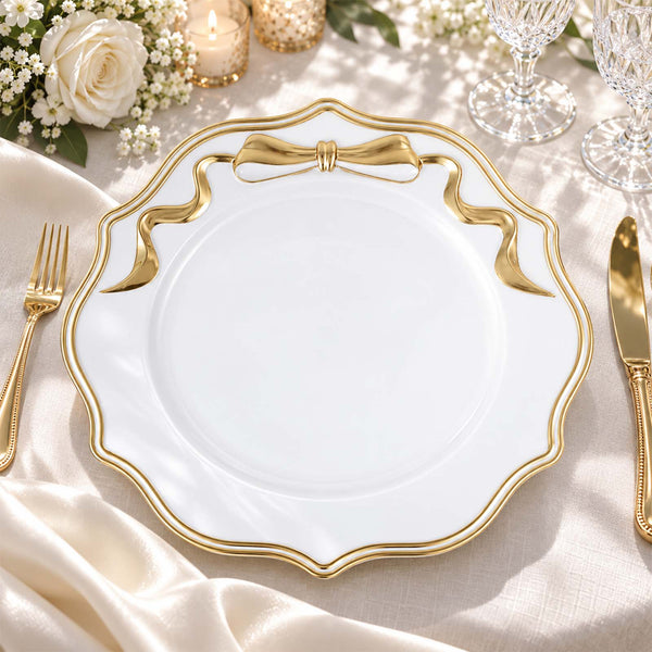Elegant white and gold luxury dinner plate on a formal table setting