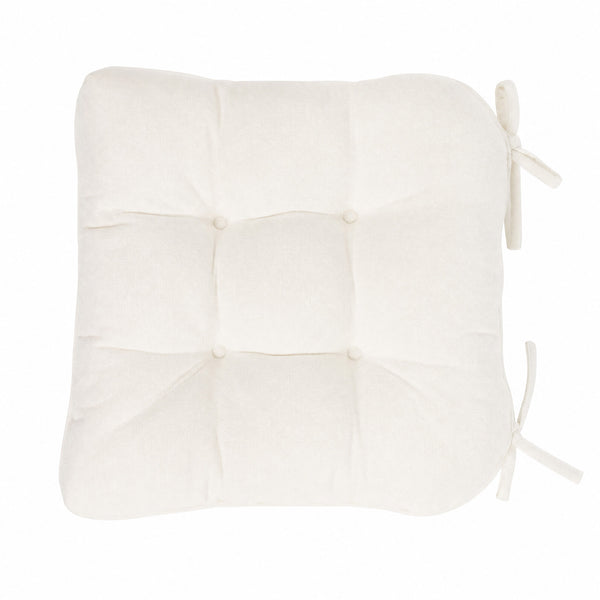White tufted chair cushion with side ties, isolated on white background#whtbkgd