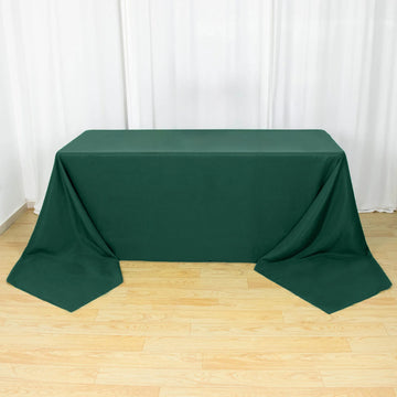 Add Elegance to Your Event with the Hunter Emerald Green Seamless Premium Polyester Rectangular Tablecloth
