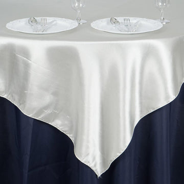 Create Memorable Table Decor with Ivory Satin Overlays