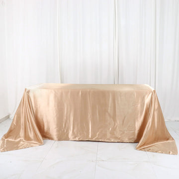 Elevate Your Event with the Nude Satin Seamless Rectangular Tablecloth 90"x132"