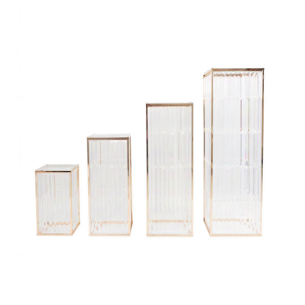 Set of four clear ribbed glass storage boxes with gold trim #whtbkgd