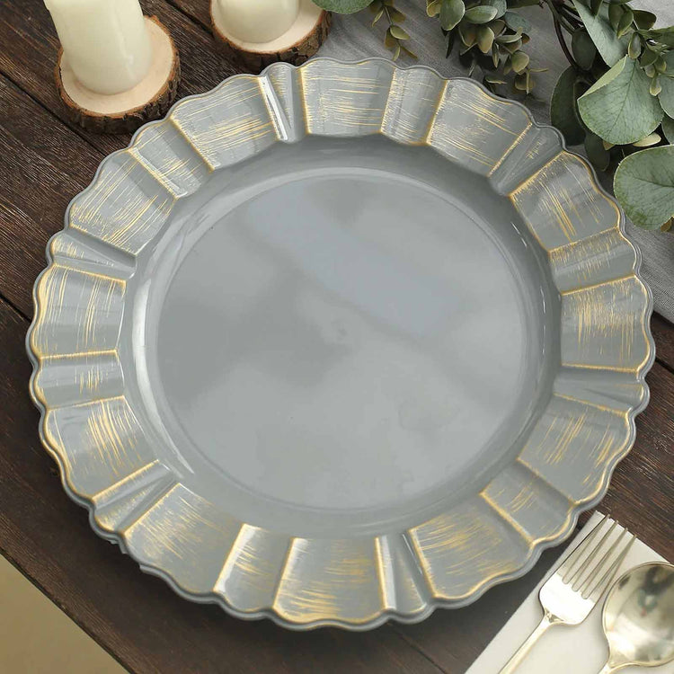 Acrylic charger plates - a charcoal gray and gold plastic charger plate with measurements of 13 inch