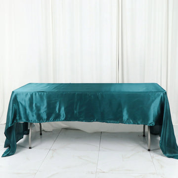 Add Elegance to Your Event with the Peacock Teal Seamless Satin Rectangular Tablecloth