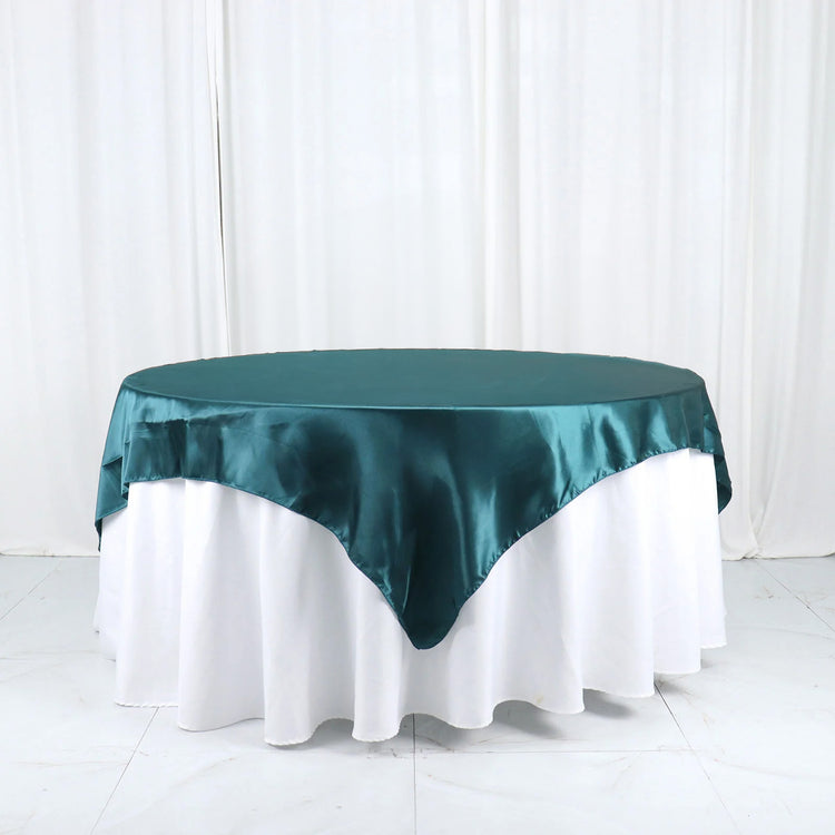 72x72 Inch Peacock Teal Seamless Satin Square Table Overlay