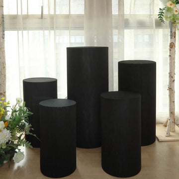 Enhance Your Event with Black Spandex Cylinder Plinth Covers