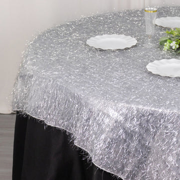 Transform Your Event with the Silver Metallic Fringe Shag Tinsel Table Overlay