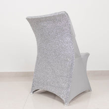 A folding spandex fitted chair cover in silver color on a white background with measurements