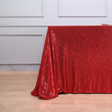 Enhance Any Event with the Red Seamless Premium Sequin Rectangle Tablecloth