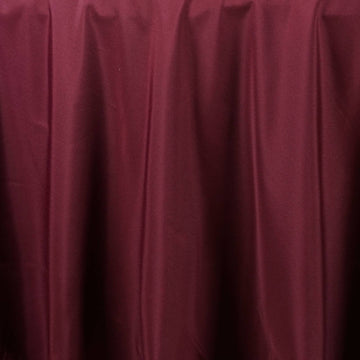 Enhance Your Event Decor with a Burgundy Seamless Polyester Round Tablecloth 120