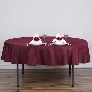 Add Elegance to Your Event with the Burgundy Seamless Polyester Round Tablecloth 90''
