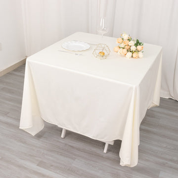 Elevate Your Event with the Ivory Premium Scuba Square Tablecloth