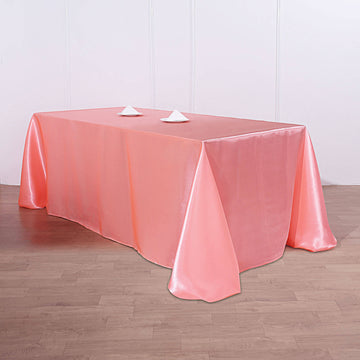 Experience Luxury with the Coral Red Satin Seamless Rectangular Tablecloth
