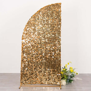 Gold sequin backdrop with floral arrangement