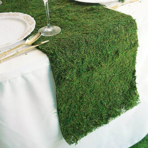 Green moss table runner for elegant dining decor.