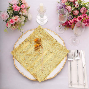 Elegant golden table napkin with floral decoration on a beautifully set dining table.