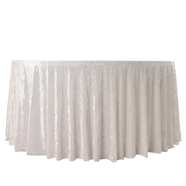 White round tablecloth draped over banquet table, elegant event linen