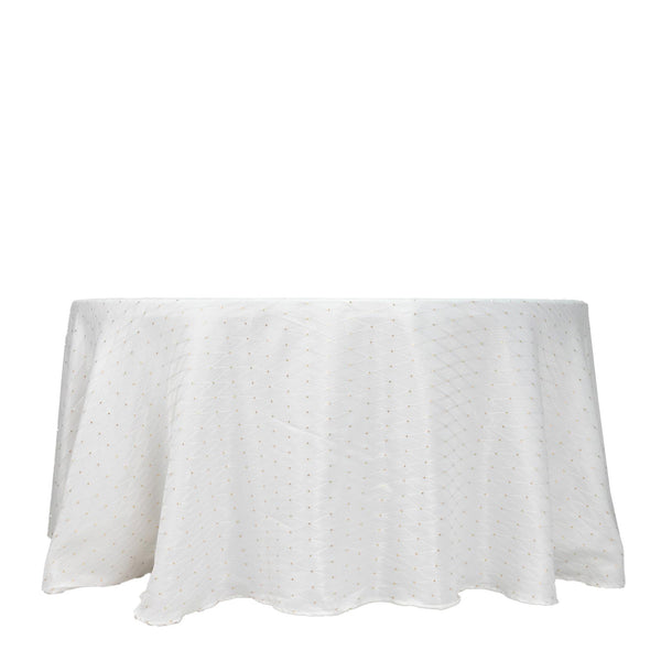 White round tablecloth with subtle gold dot pattern on a round table
