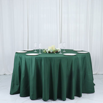 Add Elegance to Your Event with the Hunter Emerald Green Seamless Polyester Round Tablecloth 132