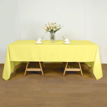 Brighten Up Your Event with the Yellow Seamless Polyester Rectangular Tablecloth