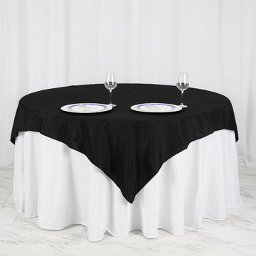 Elevate Your Event with the Black Square Seamless Polyester Table Overlay 70"x70"