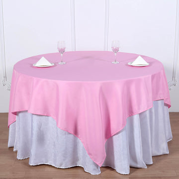 Create a Chic and Elegant Atmosphere with the Pink Square Seamless Polyester Table Overlay 70"x70"