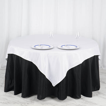 Elevate Your Event Decor with a White Square Polyester Table Overlay