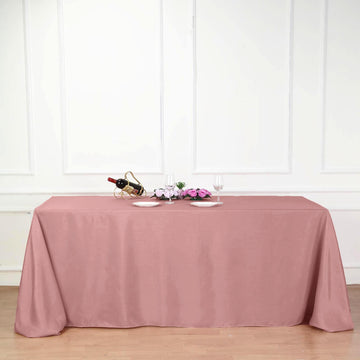 Add Elegance to Your Event with the Dusty Rose Seamless Polyester Rectangular Tablecloth 90"x132"