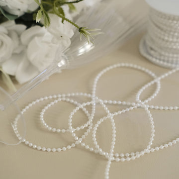 Create a Timeless and Elegant Look with Glossy White Faux Pearl String Garland