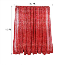 A Metallic Shimmer Tinsel Spandex Red Curtain with measurements of 20 ft and 10 ft, perfect for room divider, paired with our sparkle & sequin backdrops.