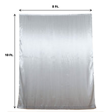 A silver satin backdrop curtain in a rectangle shape, perfect as a room divider