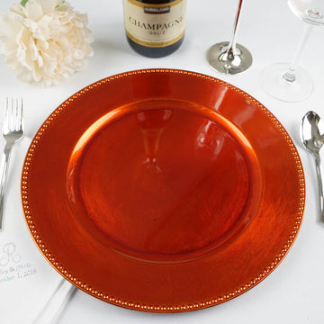 Create a Stunning Table Setting with the 6 Pack Beaded Orange Acrylic Charger Plate