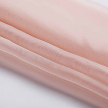 A close up of a piece of Blush Sheer Organza fabric