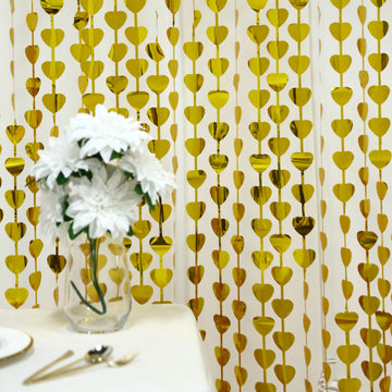 Create a Magical Atmosphere with the Gold Heart Chain Foil Curtain